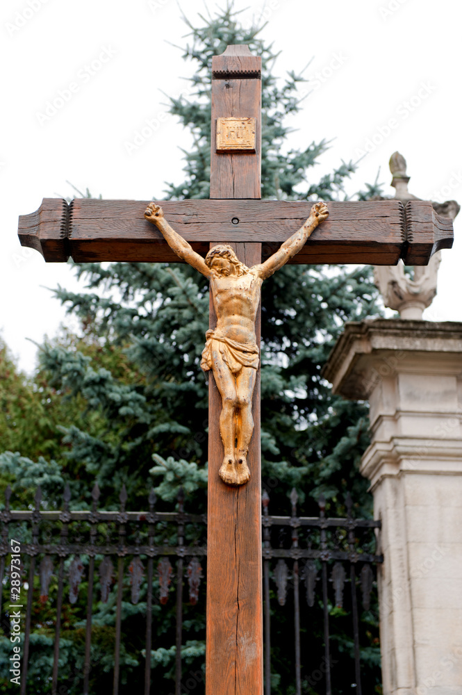 The crucifixion from a tree with Jesus's gilt figure