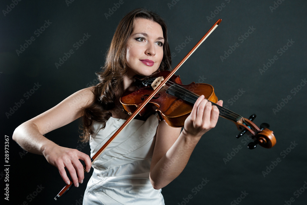 violinist on black background