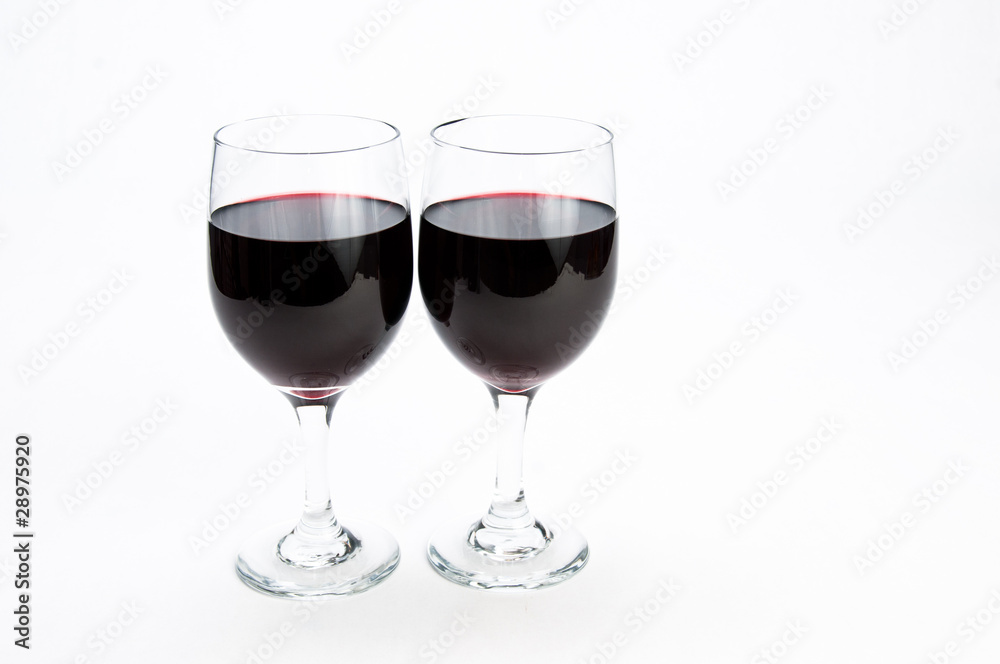 Two glasses of red wine on isolating background Two glasses of red wine on isolating background