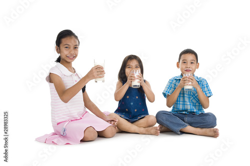 siblings drinking milk