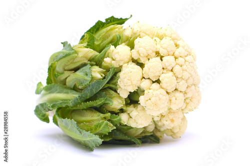 Cauliflower with green leaves isolated on white background