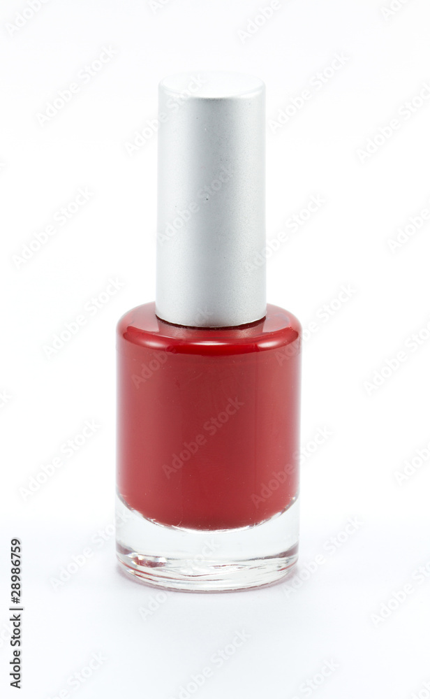 A bottle of red nail polish Isolated on white background A bottle of red nail polish Isolated on white background