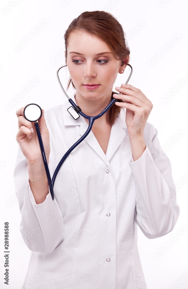 Doctor keeps on hand stethoscope. Isolated on a white. Doctor keeps on hand stethoscope. Isolated on a white.