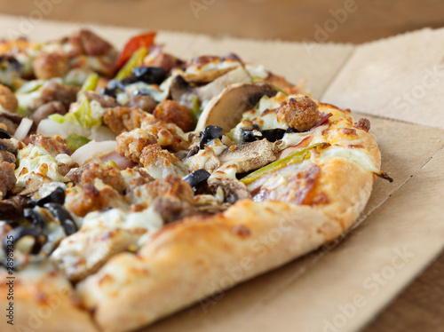 Pizza closeup with supreme toppings