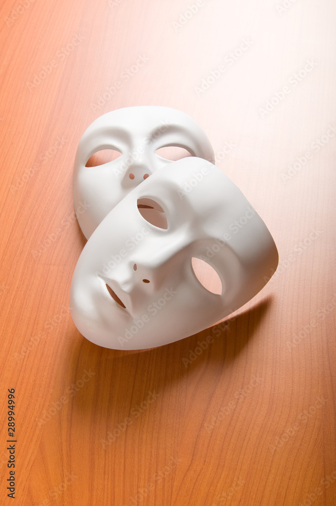 Theatre concept with the white plastic masks Theatre concept with the white plastic masks