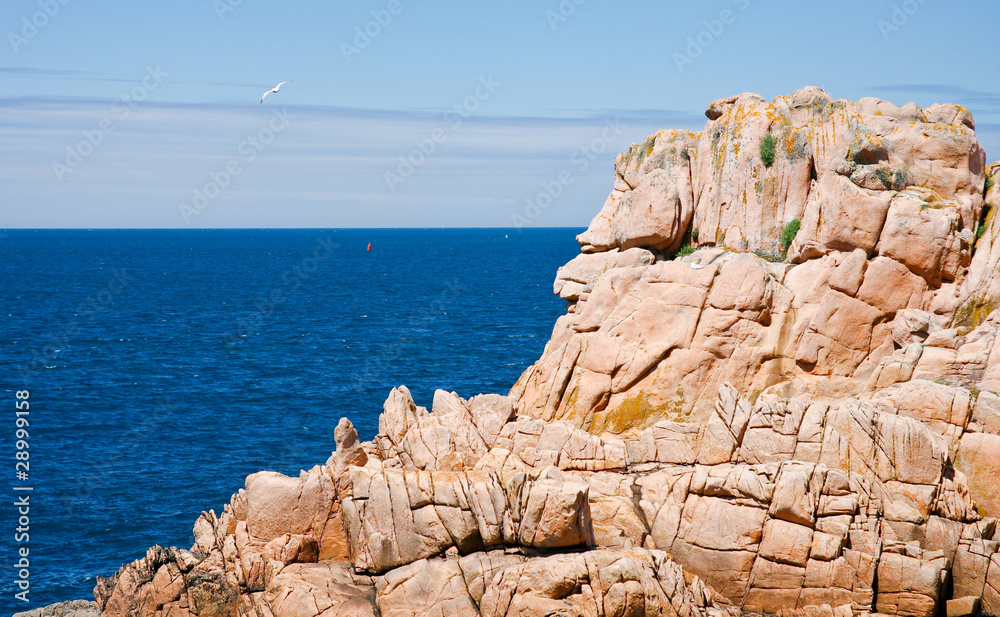 view on sea through pink cliff