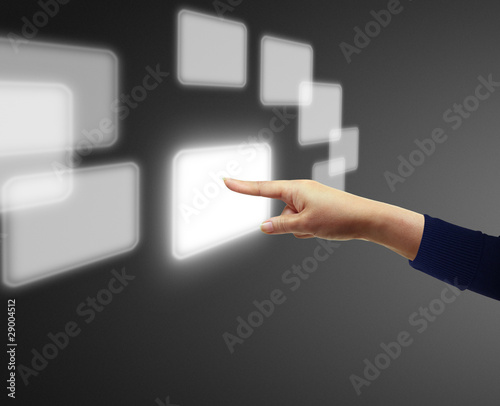 hand pushing on a touch screen interface