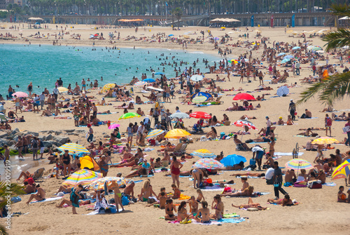People relaxing on the beach