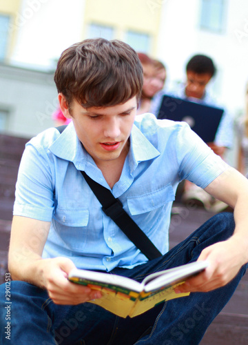 young man read book