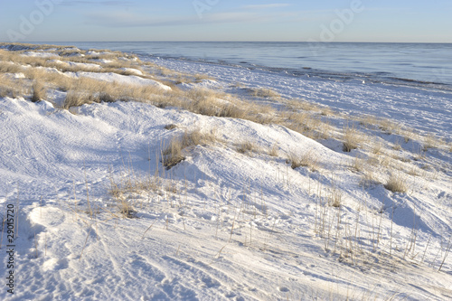 Sand dunes covered with snow