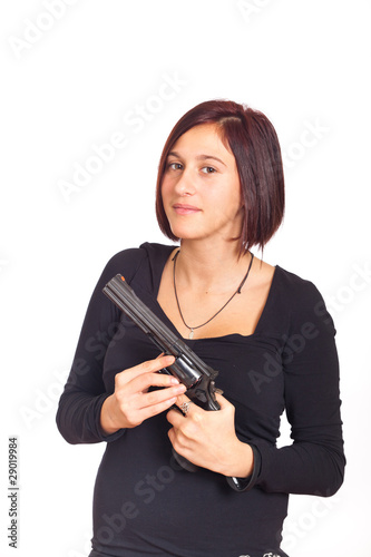 Young Woman Blowing on His Gun After Shooting