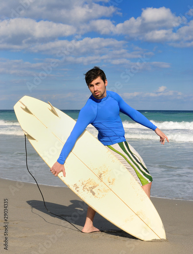 Surfer Posing in the Beach
