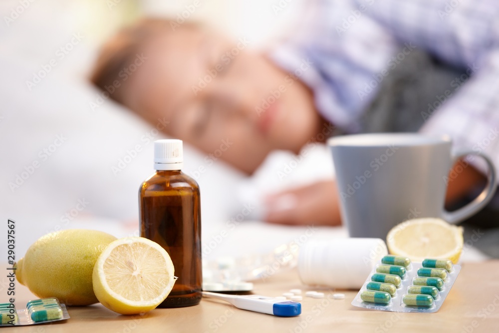 Vitamins medicines for flu woman in background - obrazy, fototapety, plakaty 