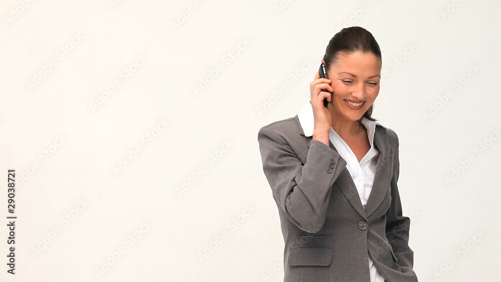 Smilling and pretty businesswoman phoning Smilling and pretty businesswoman phoning