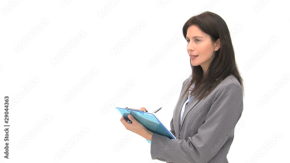Smiling businessman writting on her notebook Smiling businessman writting on her notebook