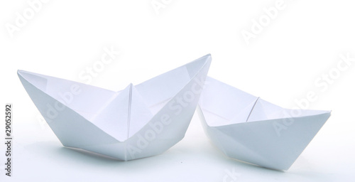 Three paper ships isolated on white