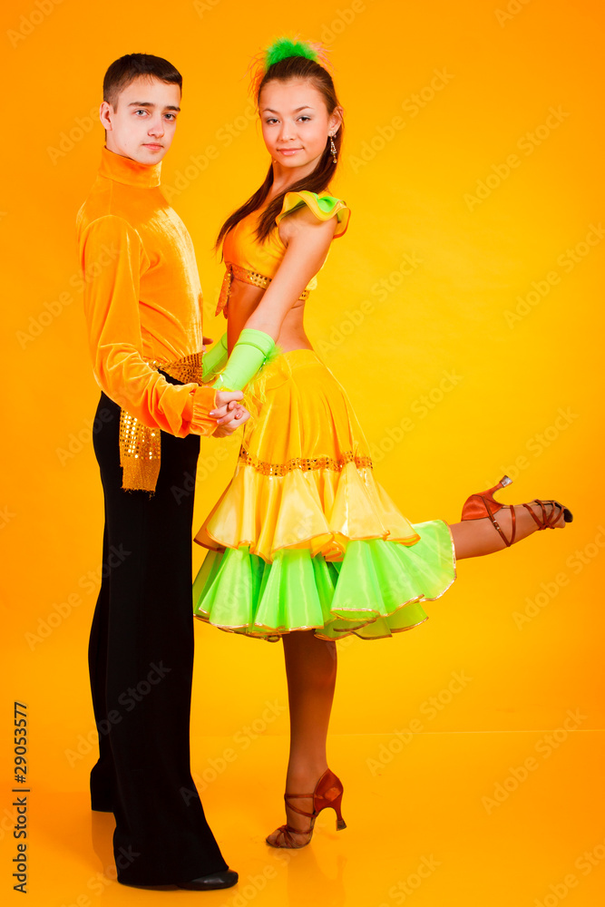 charming young pair in good-looking suits charming young pair in good-looking suits