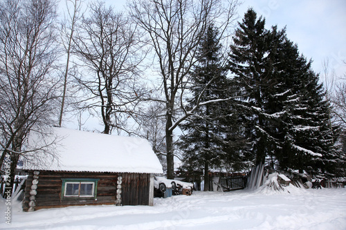 House in winter covered with snow, North Europe