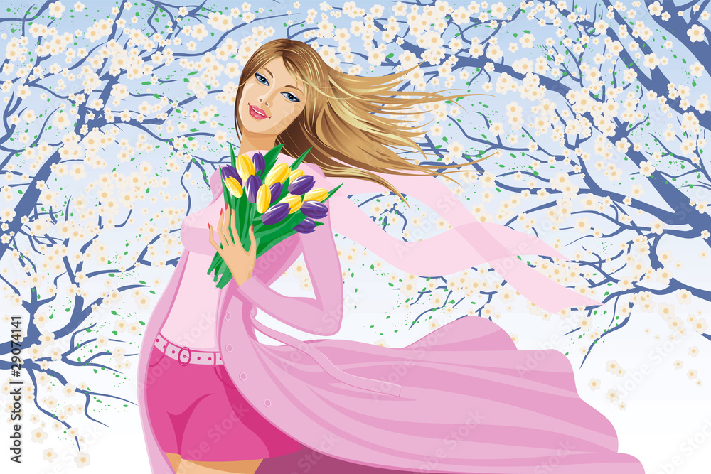 Young woman holding a bunch of tulips outside on a spring day