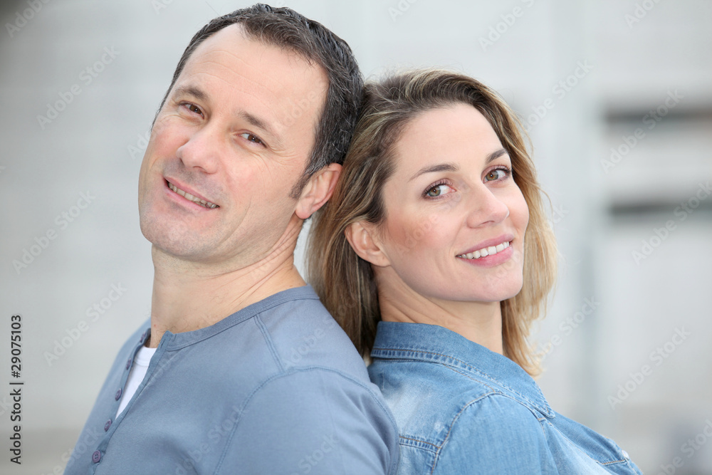 Portrait of happy couple standing outdoors Portrait of happy couple standing outdoors