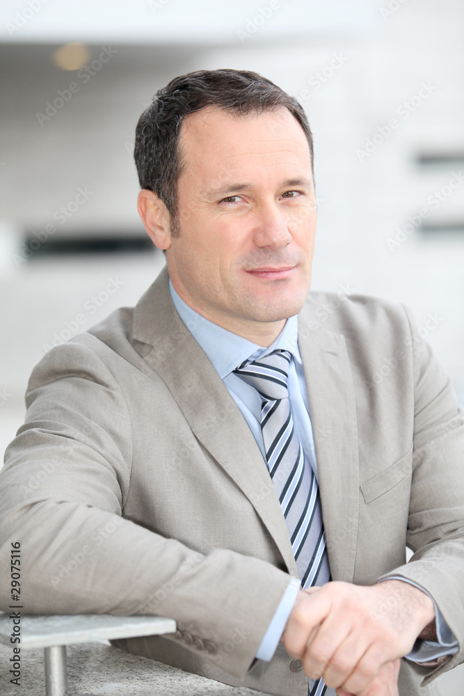 Businessman standing outside the office