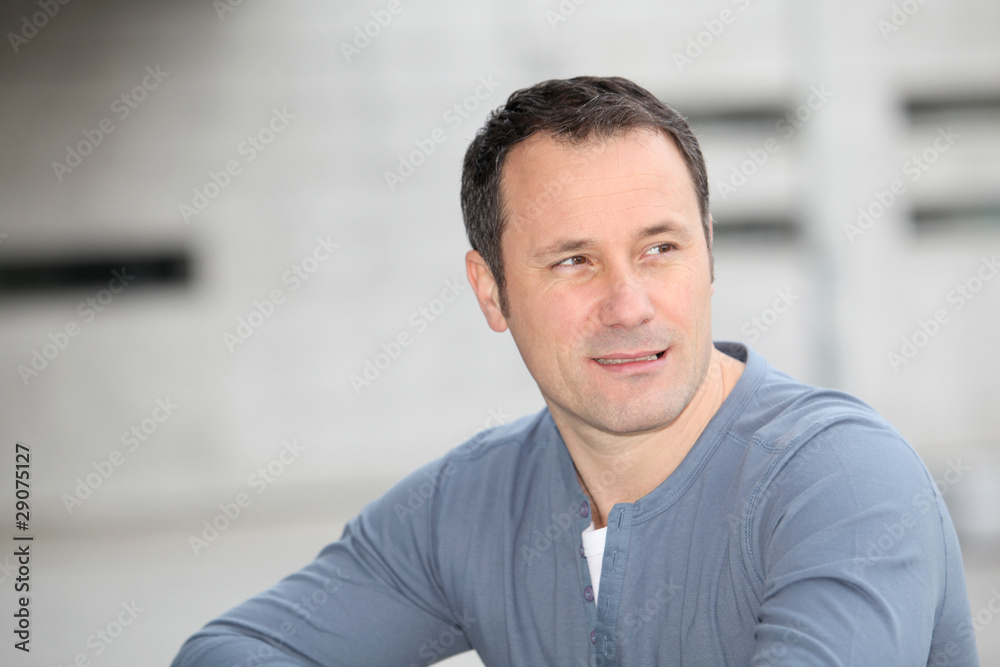 Portrait of hansome man standing in the street Portrait of hansome man standing in the street