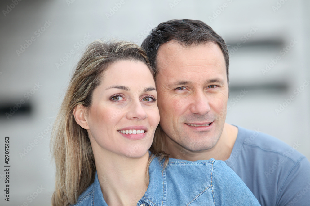 Portrait of happy couple standing outdoors Portrait of happy couple standing outdoors