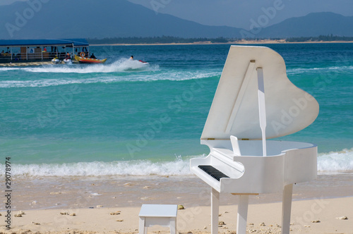 Piano on beach photo