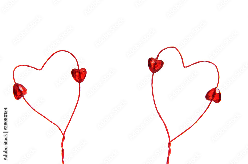 Wire red hearts isolated on white background