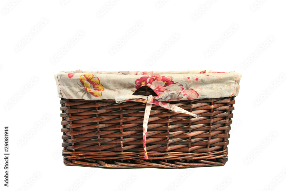 Obraz premium empty wicker basket isolated on white
