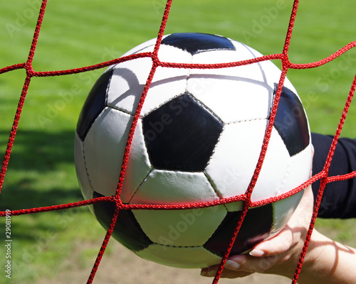 Fußball im Tor mit Hand - Soccer Goal photo