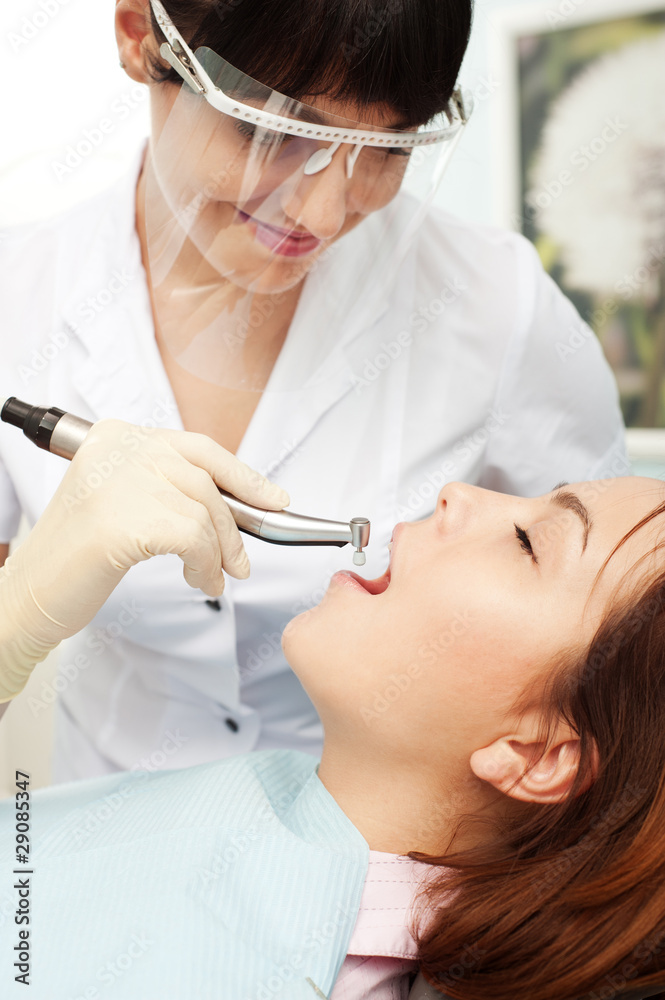 doctor and patient at dentist's office doctor and patient at dentist's office