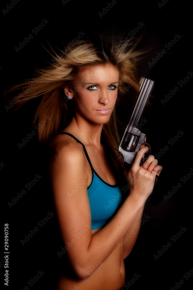 Woman halter top gun serious Woman halter top gun serious