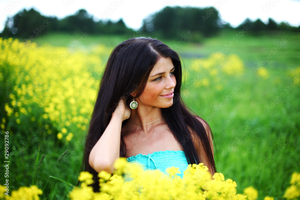 woman on oilseed field