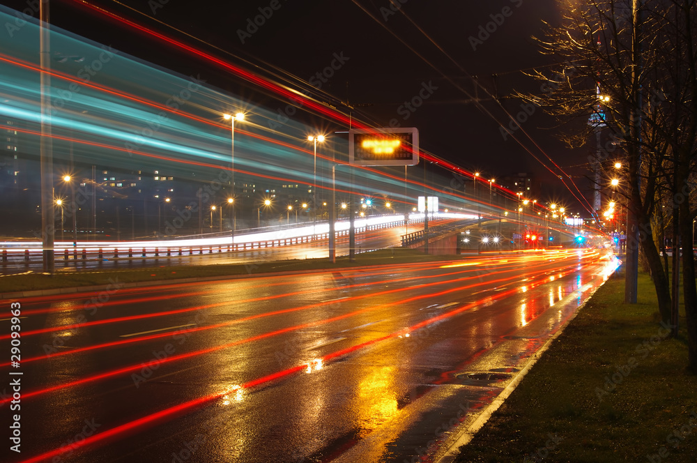 Fast moving cars at night
