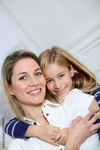 Portrait of happy mother and little girl