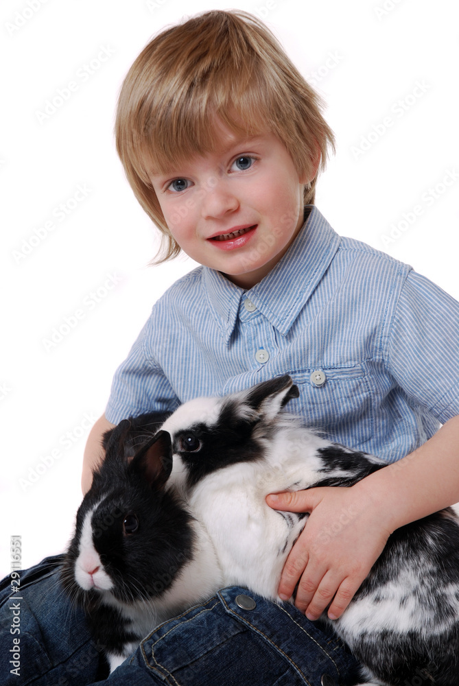 Junge mit Kaninchen Junge mit Kaninchen
