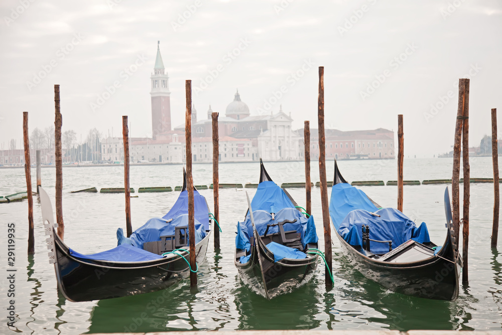 Three gondolas in Venice