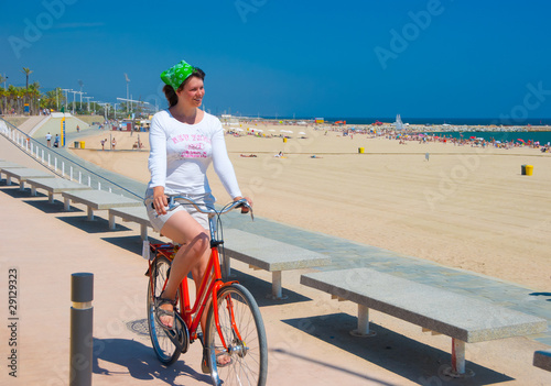 Photography Young woman riding her bike