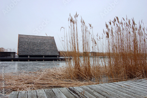 Hut in frozen lake