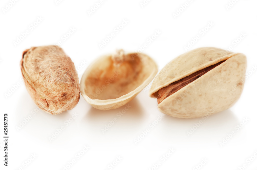 Group of pistachios over white background. SDOF Group of pistachios over white background. SDOF