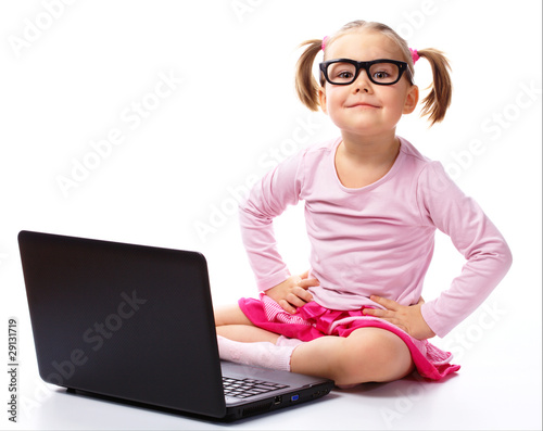 Little girl with laptop