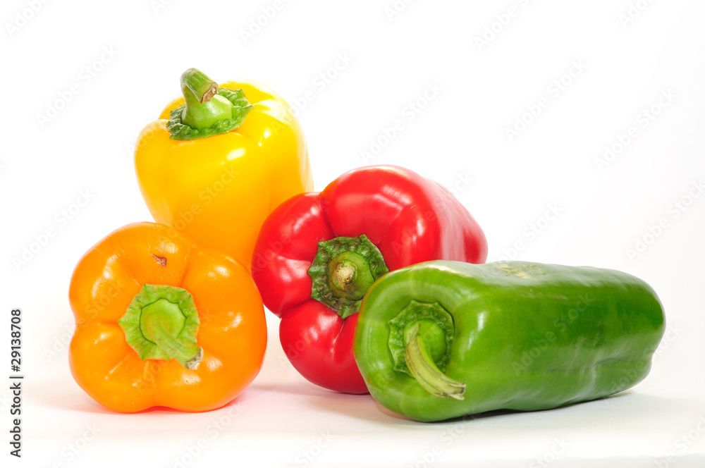Bell peppers of different colors isolated on white background. Bell peppers of different colors isolated on white background.