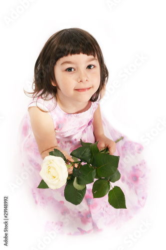 Girl with white rose isolated on white background. Studio shot.