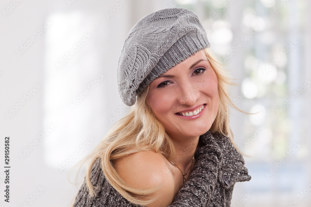 Beauty, blondie woman wear a grey-colored hat Beauty, blondie woman wear a grey-colored hat