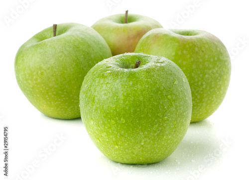 Four ripe green apples