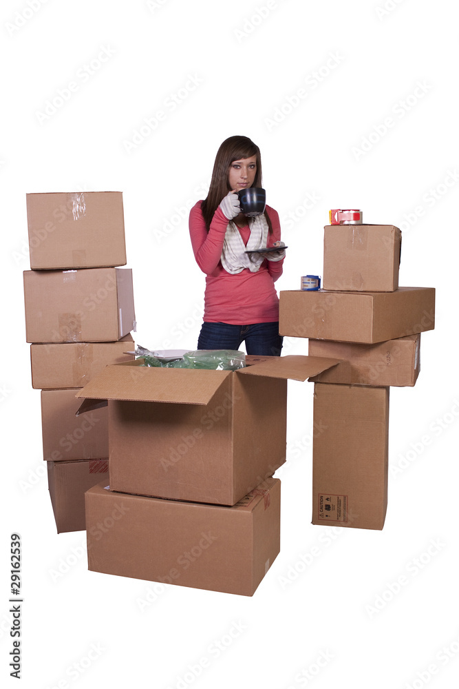 young girl packing up and moving - isolated young girl packing up and moving - isolated