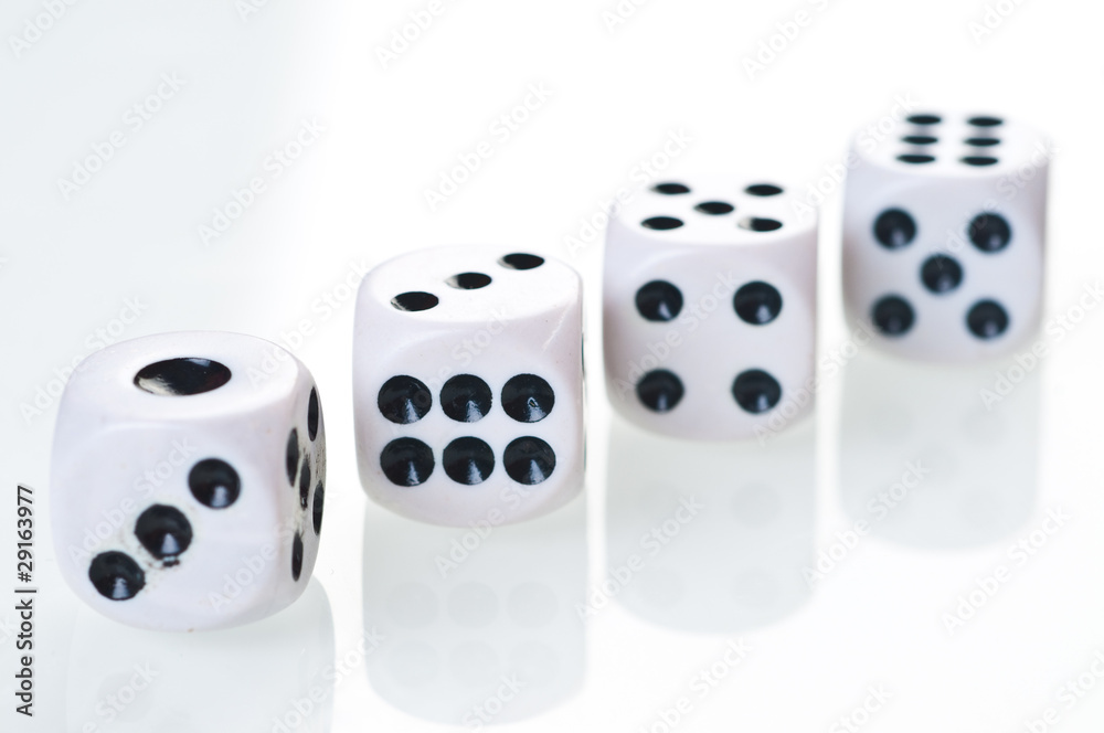 dices falling down against white background. dices falling down against white background.