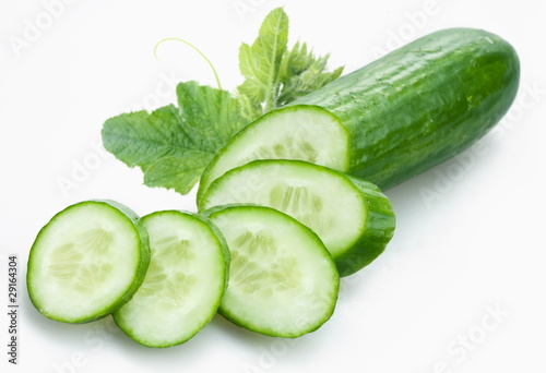 Cucumber and slices isolated on a white background