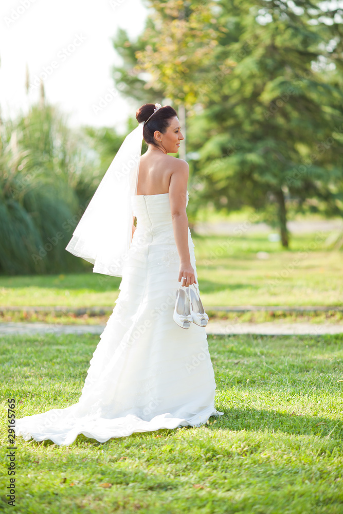 beautiful wedding bride with flowers on garden beautiful wedding bride with flowers on garden